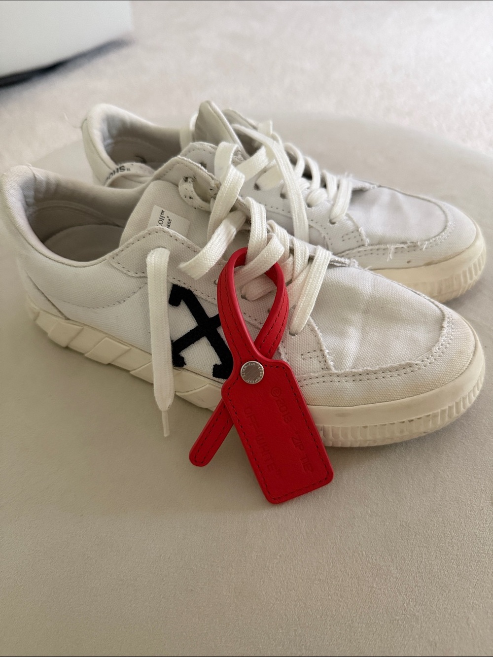 Off-White White Low-Top Sneakers with Black Arrow and Red Tag
